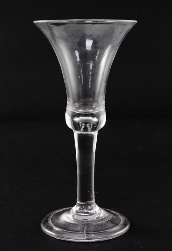 A glass goblet, c.1735, 19cm